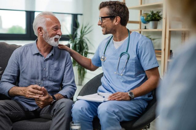 male doctor consulting patient